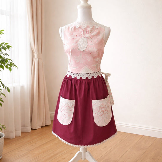 Adult apron made from vintage table linens and paired with a burgundy fabric.