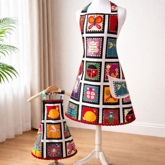 Adult apron made with a fun bright bug print and trimmed with red rick rack