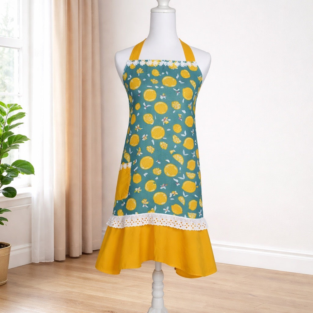 Adult apron made with a fun lemon print fabric and trimmed with yellow rick rack