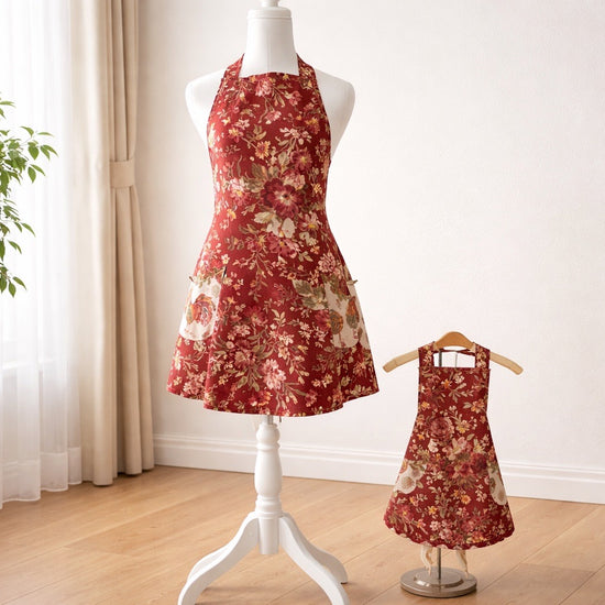 Adult apron made from an earthy floral print with chicken accent fabric