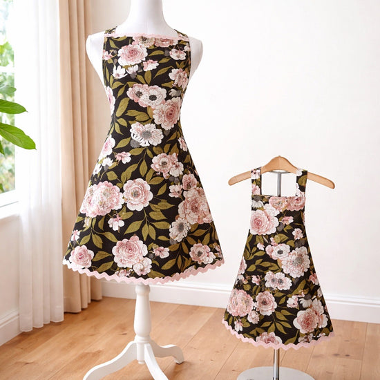 Adult size apron with beautiful floral print fabric and light pink trim