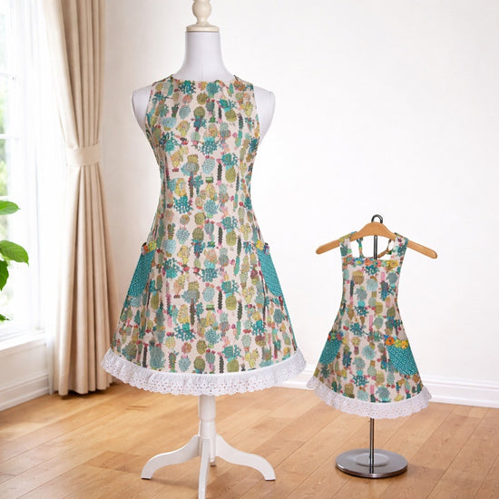 Adult apron with fun cactus fabric and multi color trim