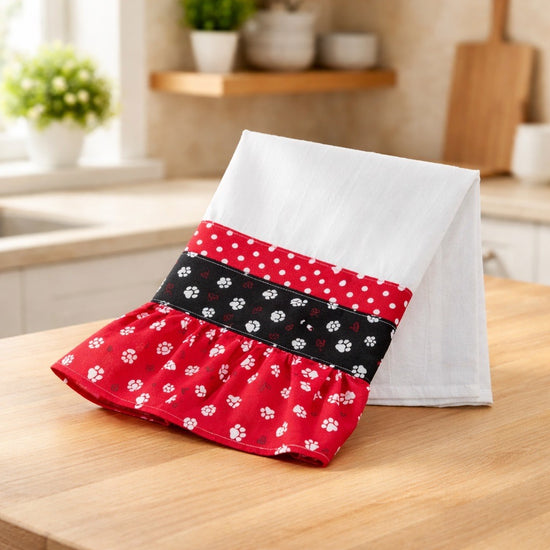 Flour sack kitchen towel with fun paw prints